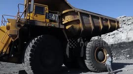 Huge trucks aid open-pit mining activities in Shanxi, China