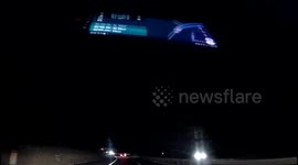 Car pushed off m11 and rolls down embankment