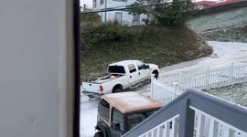 Truck Slides Down Icy Hill
