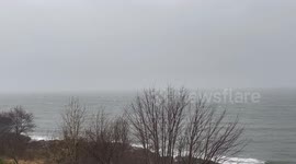 Winds and rain strengthening on Loch Long in Argyll Scotland this afternoon, with local roads already flooding