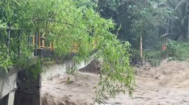 Bridge washed away by surging floods in the Philippines
