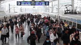 Passengers at the railway station in Shanghai, China