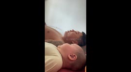 Adorable Baby Mimics Dad Lifting Up Head in China
