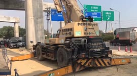 Crane falls on motorway killing one worker in Bangkok