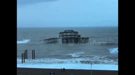 Strong winds and waves continue across the English Channel at Brighton as UK begins Storm Isha clear up