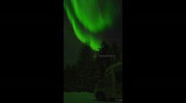 Rare spectacle: intense pink and red aurora illuminates Finnish night sky in stunning video