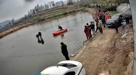 Police save Chinese couple stranded on car roof in pond after woman mistakenly hits accelerator