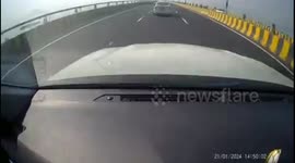 Dramatic dashcam footage captures car flip over on highway in western India