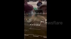 UK: Storm Isha’s Winds Blow Suitcase Across Tarmac At Edinburgh Airport