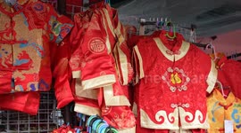 Chinese New Year outfits fill market stalls in Bangkok