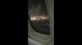 Night time landing into Belfast City with an excited child squealing