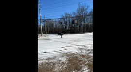 SUV Slides Down Hill and Collides With Car in Icy Parking Lot
