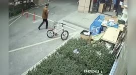 Man trips on steps and bumps head on open door while staring at phone