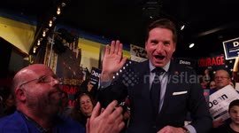 Dean Phillips takes stage to address supporters on New Hampshire Primary night