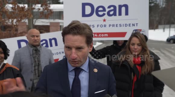 Dean Phillips greets voters at a polling site in Nashua, New Hampshire