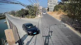 Motorist blinded by sun crashes through barrier into river