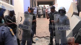 South African police remove refugees illegally occupying building in Cape Town