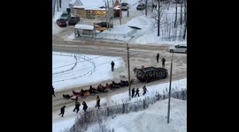 Thrilling snow tubing extravaganza: car-pulled joyride delights crowds