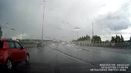 Lamborghini Hydroplaning Across Freeway