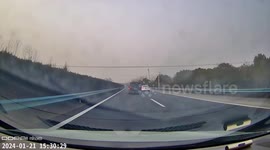 Reckless driver speeds forward after tyre detaches from car