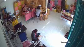 Snake bites worker's toe when she accidentally steps on it in office