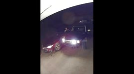 My sister backing into me in our driveway smashing me between the vehicles.