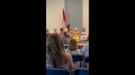 Little girl's dream 'elephant poop scooper' job leaves classmates and parents in stitches