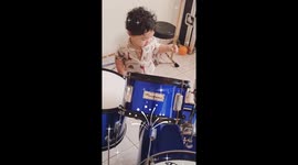 Beautiful baby loves to play the drums, every day he wakes up it's the first thing he does (play the drums)