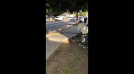Close call chaos: skateboarder narrowly dodges car in heart-stopping sidewalk stunt!