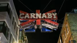 A look up to the sign of Carnaby Street in the evening, London, United Kingdom