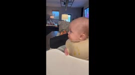 Hungry baby eagerly chomps down on food offered on spoon *Hilarious*