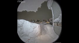 Man Groans After Snow Pile Collapses