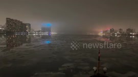 Coast Guard Cutter Braves Icy Detroit River to Aid PRENTISS BROWN at Night in MI, USA