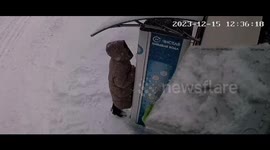 Troitsk resident narrowly escapes injury as snow block falls from roof