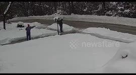 Man Slides Down Icy Driveway and Falls