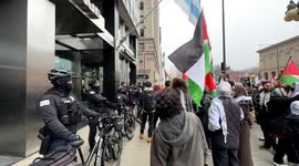 Pro-Palestine supporters protest outside Starbucks shouting