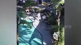 Heroic waitress plunges into pool to rescue drowning boy