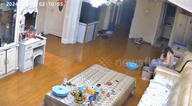 China: Couple Dons Blankets In Haste To Run Outside As M7 Quake Strikes Xinjiang