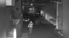 Enraged bull knocks over pedestrian walking home in China