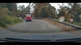 China: Truck’s Unsecured Tailgate Shatters Incoming Car’s Windshield In Sichuan