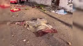 Bodies Litter Streets After Gaza Attack