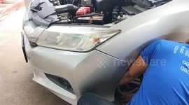 Mechanic helps save kitten stuck inside car tire