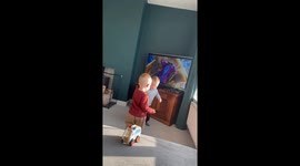 Twin toddlers dancing and singing adorably to a Chris Brown song