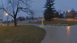 Police officer rescues two Labradors trapped in icy reservoir in Indiana