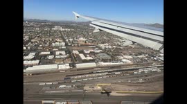 Shadow of plane and international airport of the city of Phoenix Arizona in the United States. American Airlines airline flights, airplane