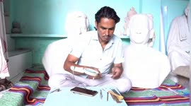 Sculptor enters Guinness World Records with smallest wooden spoon