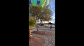 Hot Air Balloon lands right in the middle of a road *Unbelievable*