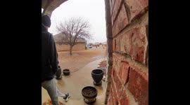 Dad Checks on Son After He Slips on Icy Walkway