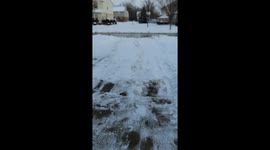 Winter workout by shoveling snow after a snow and ice storm.