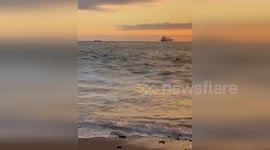 Police rescue resident drowning on beach in Chile